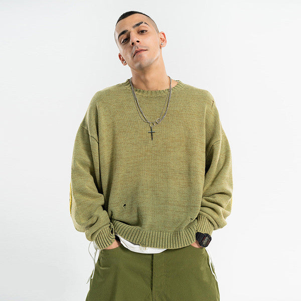 Distressed smiley face sweater